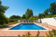 Casita Agua with private pool and fruit trees. On a peaceful location next to the Rio Grande in Alozaina, Andalusië