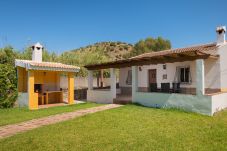 Casita Agua with private pool and fruit trees. On a peaceful location next to the Rio Grande in Alozaina, Andalusië