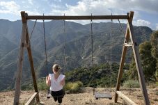 Swing at holiday home in Andalusia with panoramic views of mountains and sea