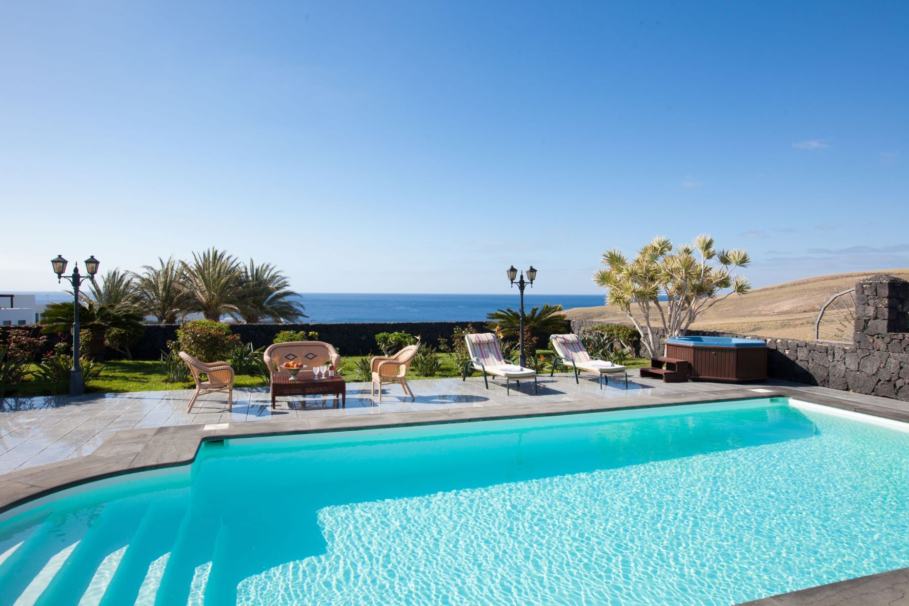 Villa Amy is a luxurious holiday home with heated private pool and sea view. Near centre of Puerto Calero, Lanzarote