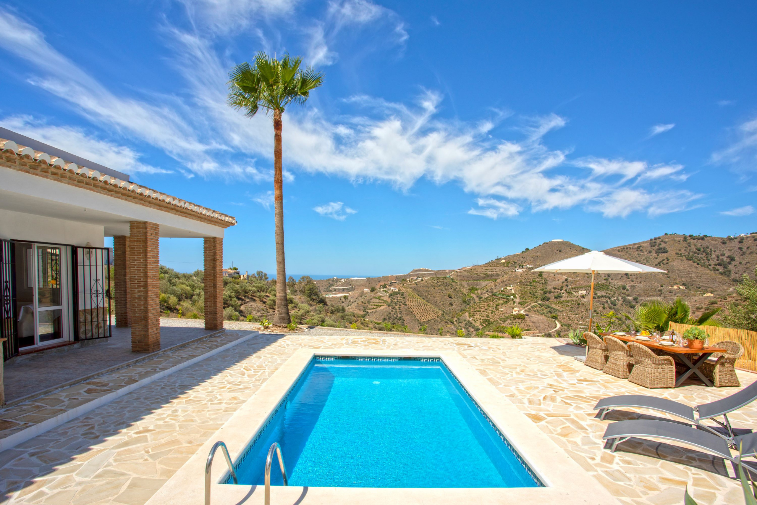 Private pool with views of green surroundings and mountains