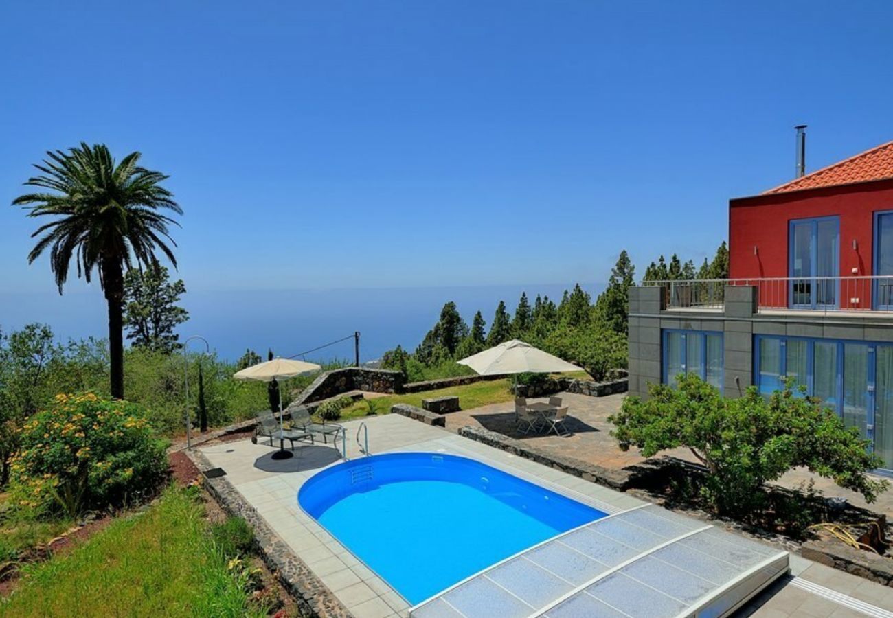 Villa Florasol is a luxurious and modern villa with heated private pool, sauna and unique seaview in Tijarafe, La Palma