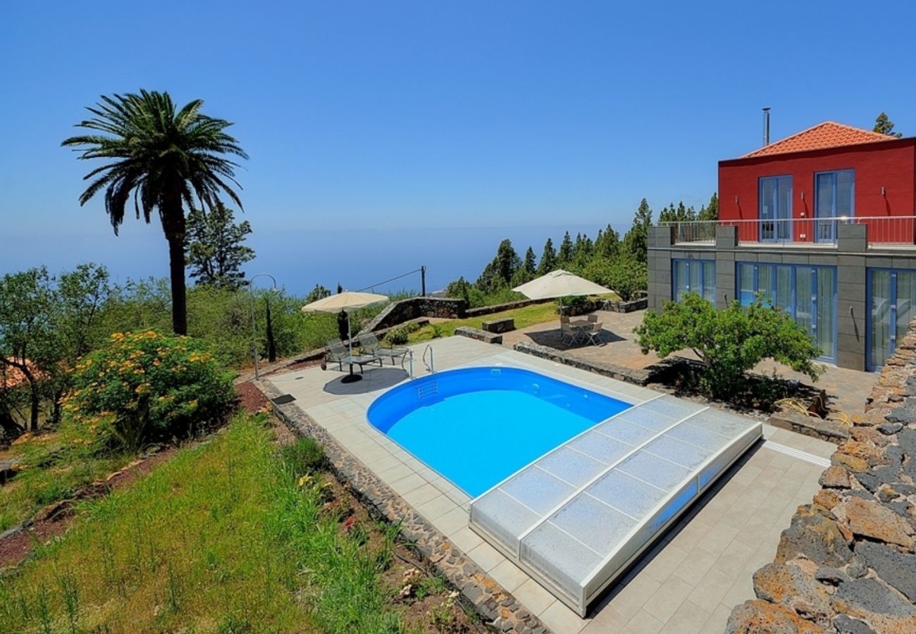 Villa Florasol is a luxurious and modern villa with heated private pool, sauna and unique seaview in Tijarafe, La Palma