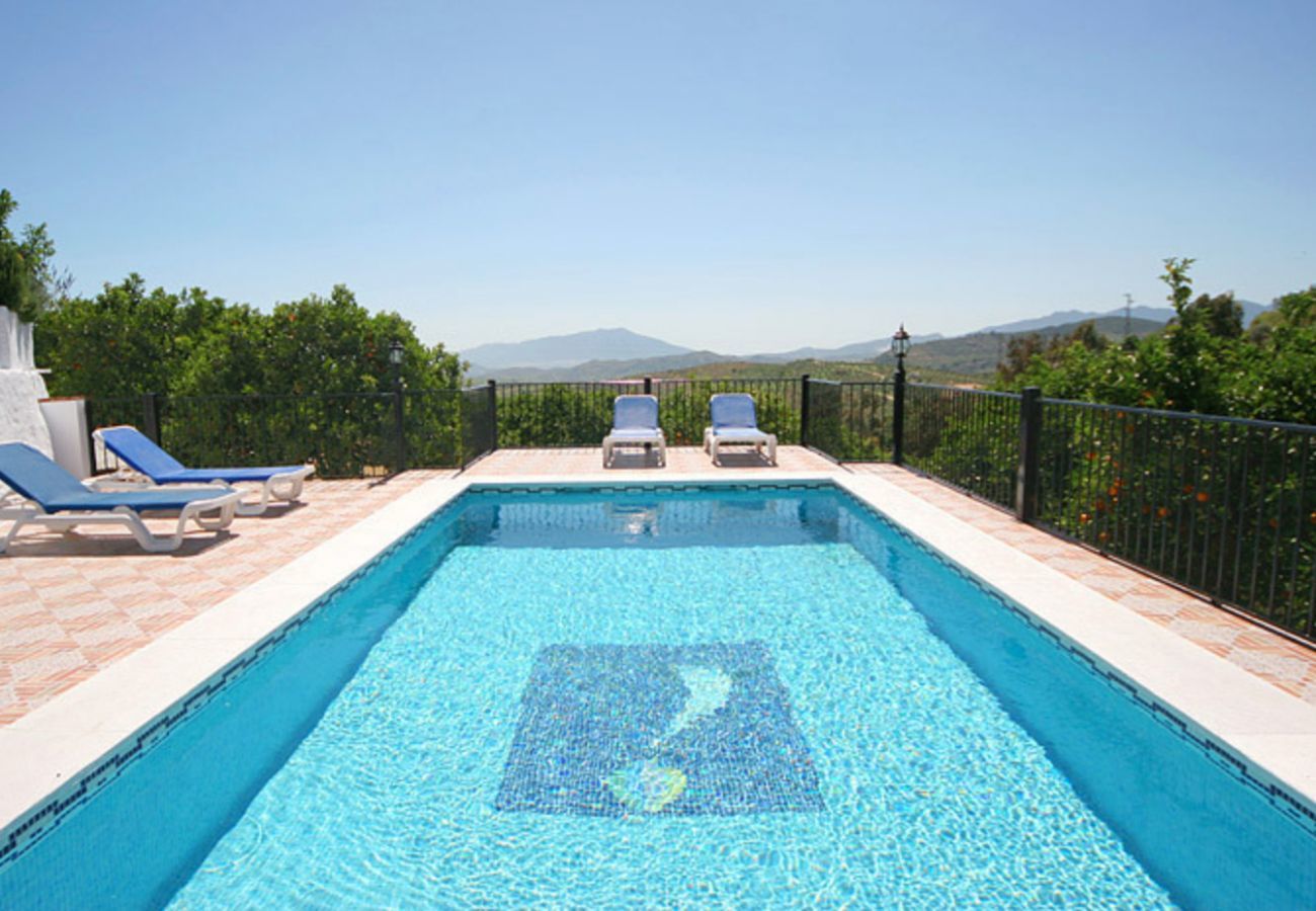 Casa Iglesia is a semi-detached villa with private pool in Alozaina, Andalusia