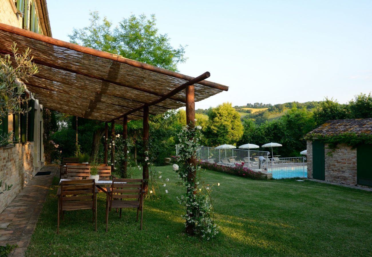 Antico Casolare is an unique villa with private pool and vineyard in Le Marche, Italy. Ideal for large groups!