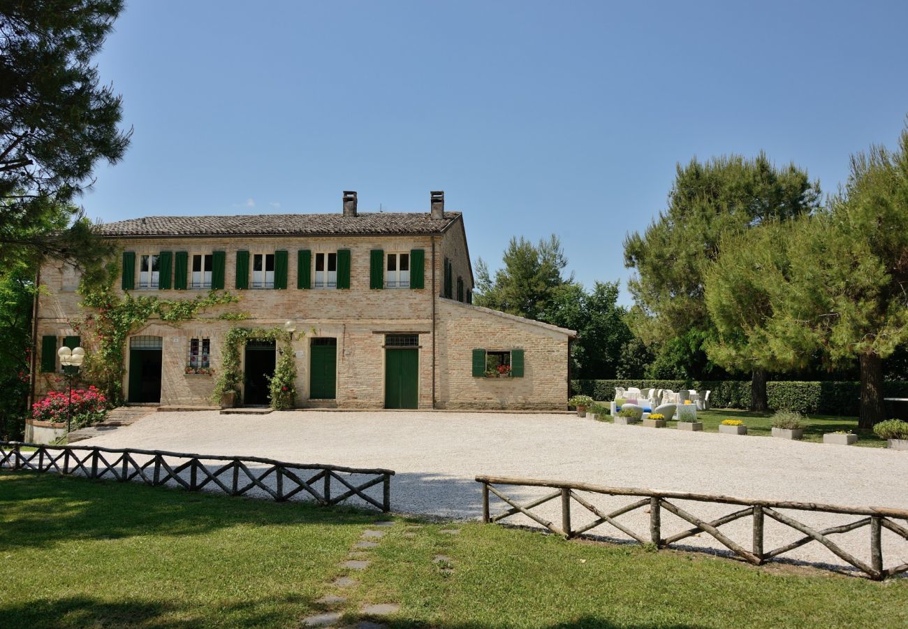 Antico Casolare is an unique villa with private pool and vineyard in Le Marche, Italy. Ideal for large groups!