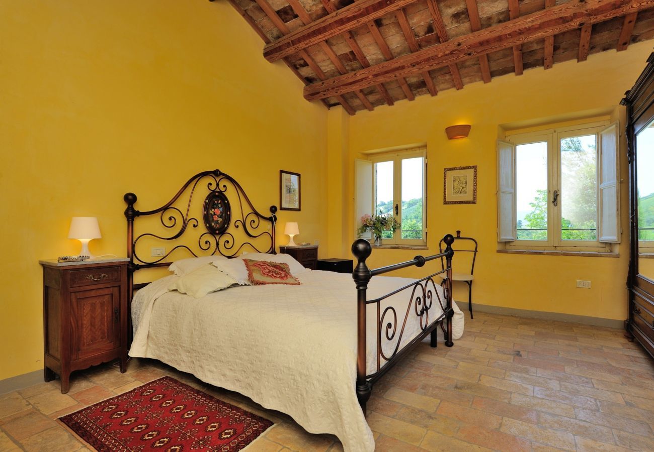 Antico Casolare is an unique villa with private pool and vineyard in Le Marche, Italy. Ideal for large groups!