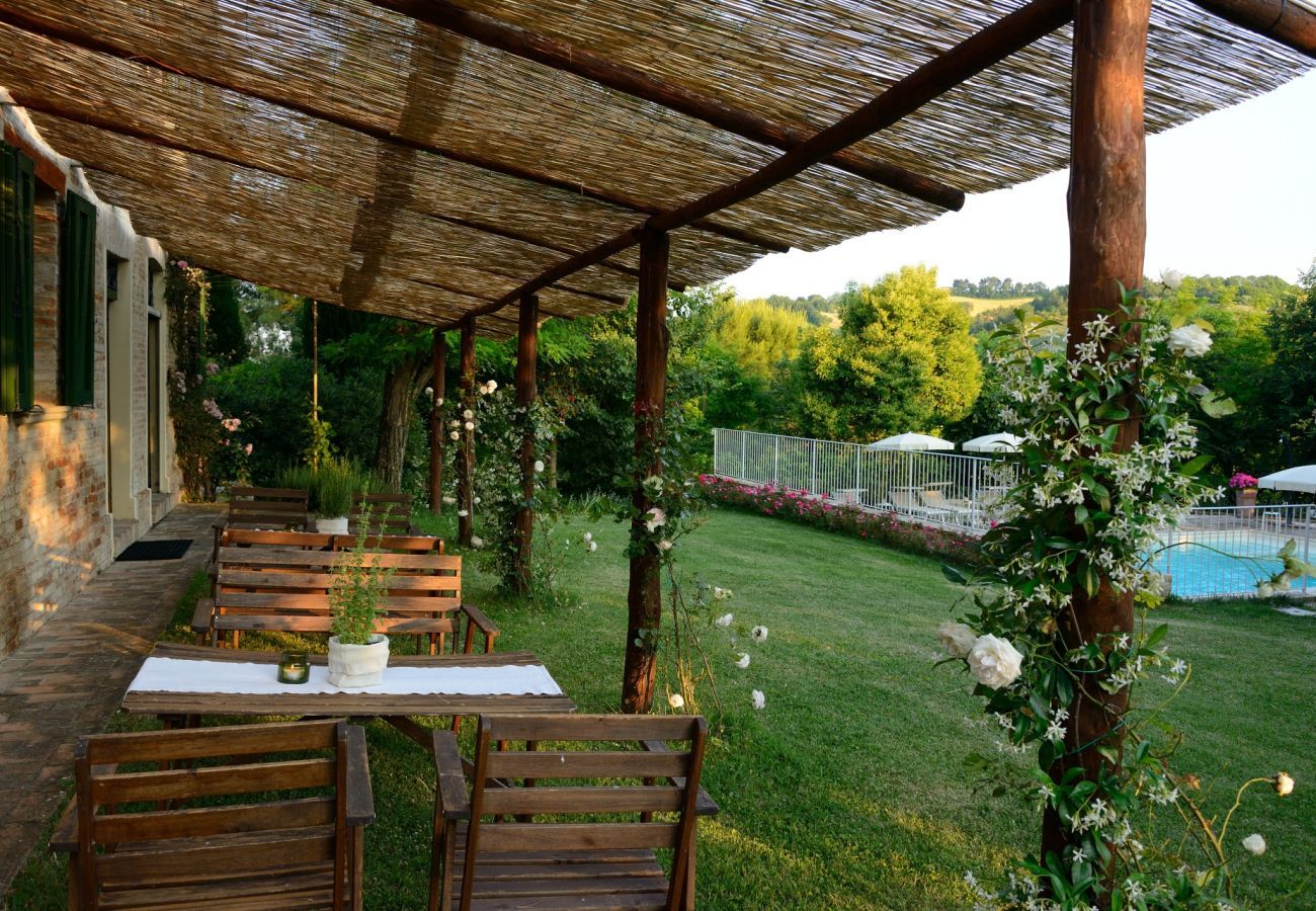 Antico Casolare is an unique villa with private pool and vineyard in Le Marche, Italy. Ideal for large groups!