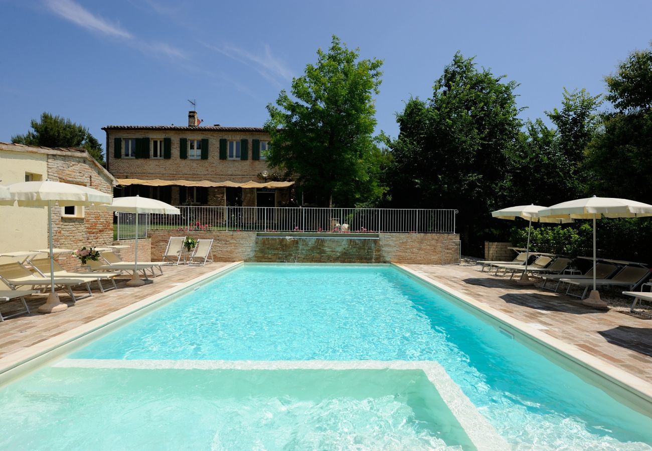 Antico Casolare is an unique villa with private pool and vineyard in Le Marche, Italy. Ideal for large groups!