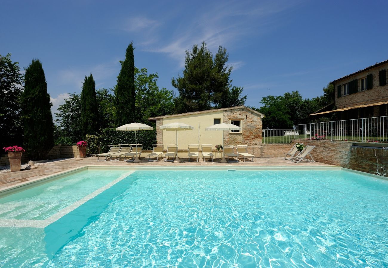 Antico Casolare is an unique villa with private pool and vineyard in Le Marche, Italy. Ideal for large groups!