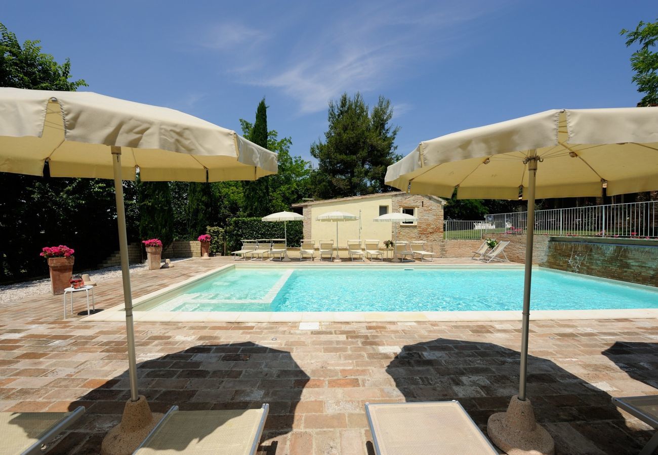 Antico Casolare is an unique villa with private pool and vineyard in Le Marche, Italy. Ideal for large groups!