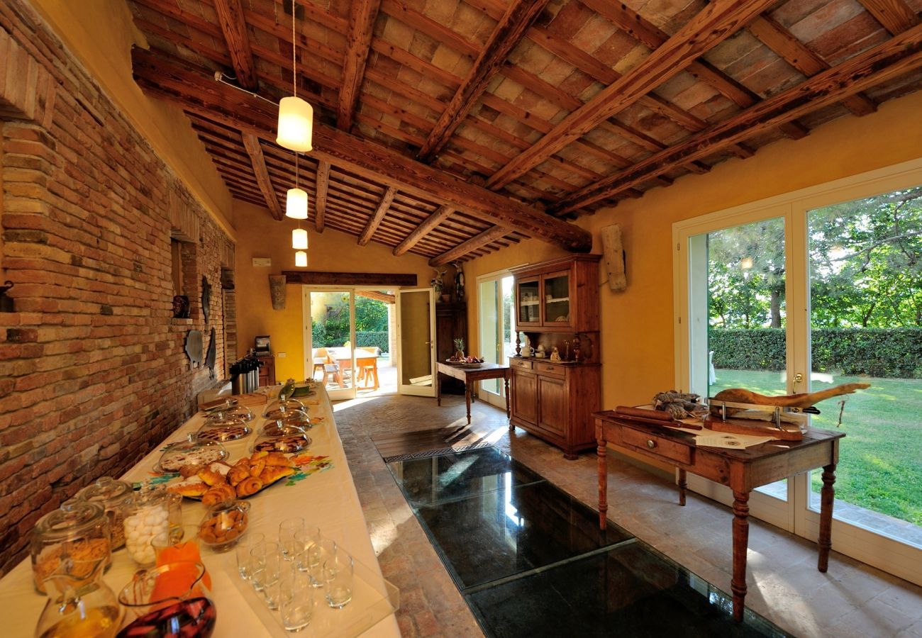 Antico Casolare is an unique villa with private pool and vineyard in Le Marche, Italy. Ideal for large groups!