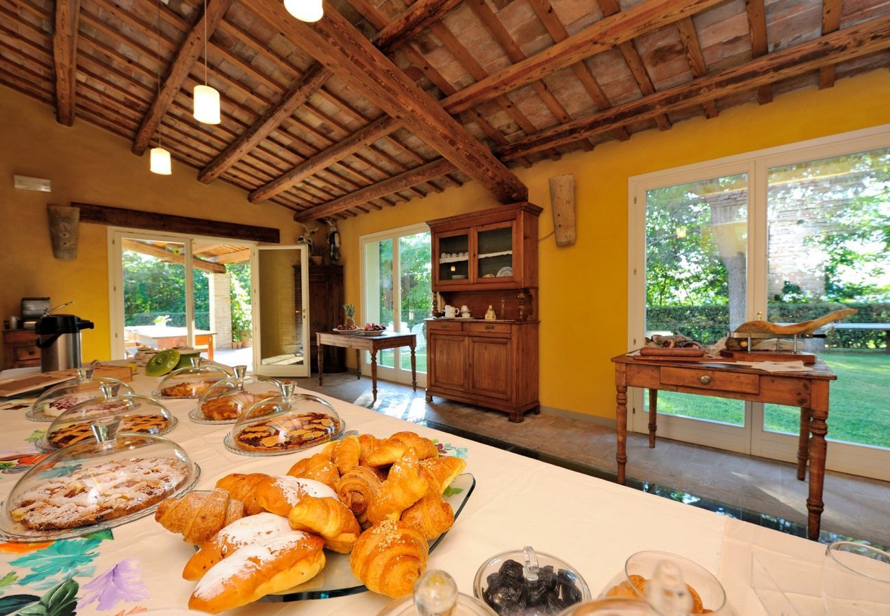 Antico Casolare is an unique villa with private pool and vineyard in Le Marche, Italy. Ideal for large groups!