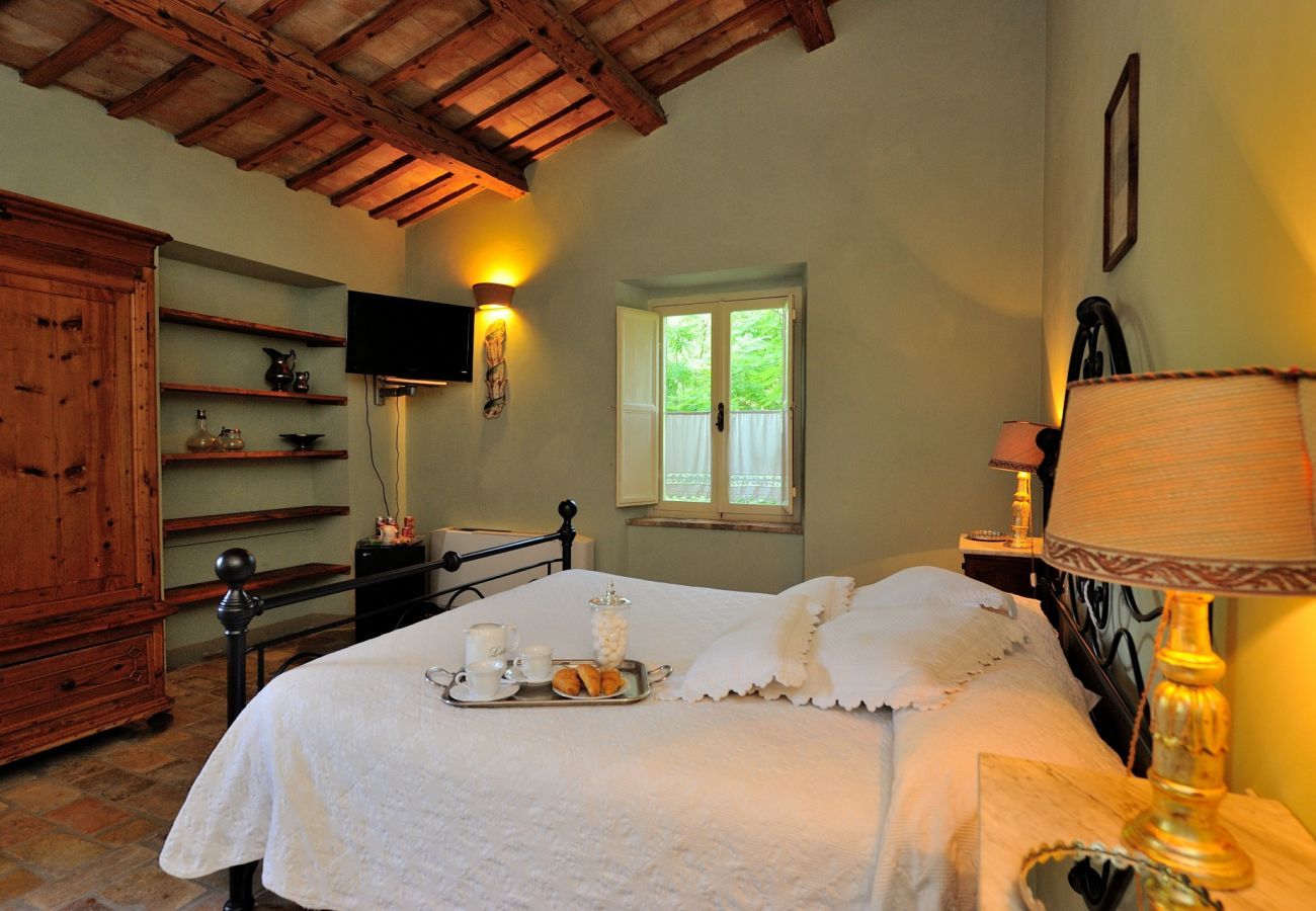 Antico Casolare is an unique villa with private pool and vineyard in Le Marche, Italy. Ideal for large groups!