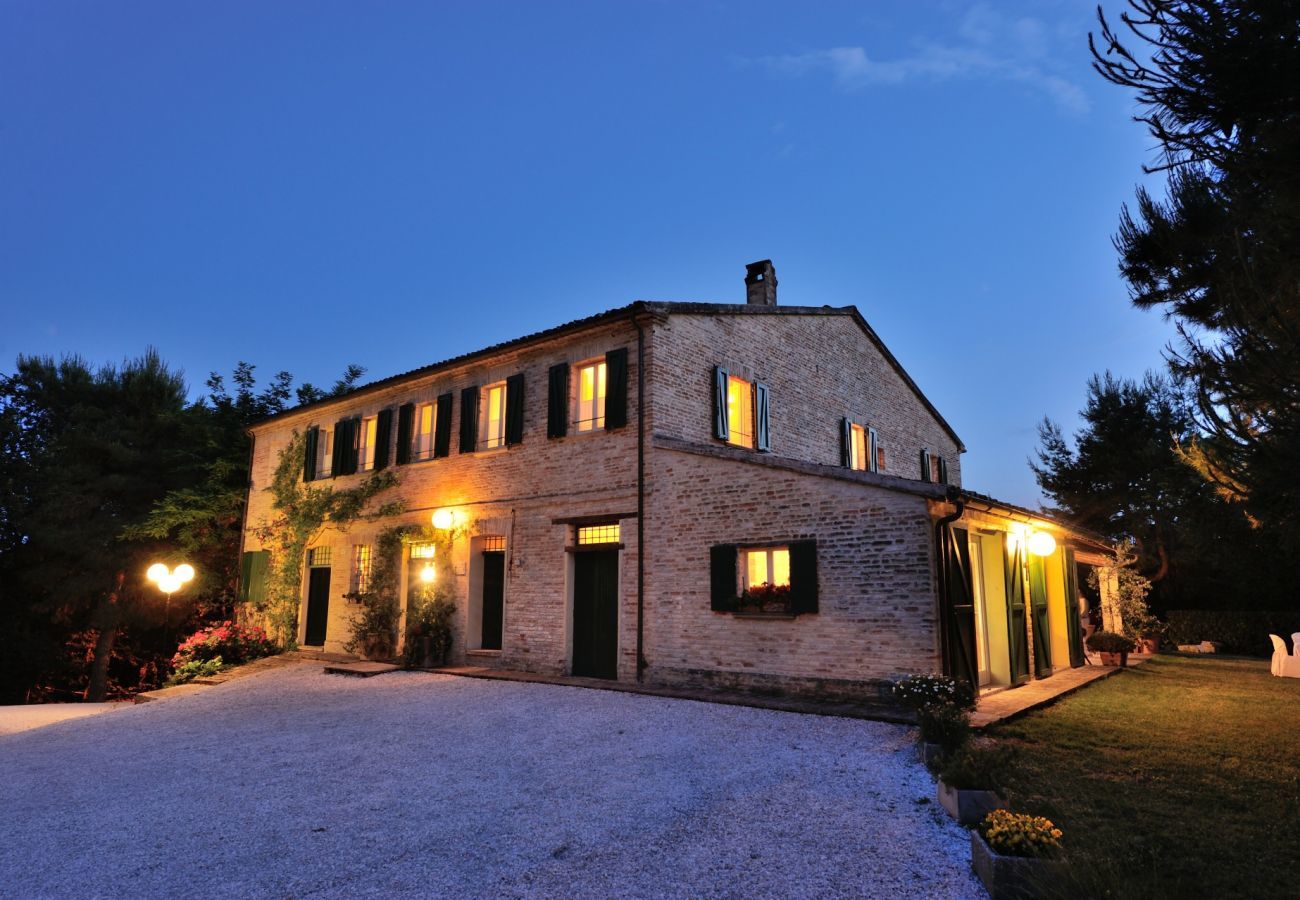 Antico Casolare is an unique villa with private pool and vineyard in Le Marche, Italy. Ideal for large groups!