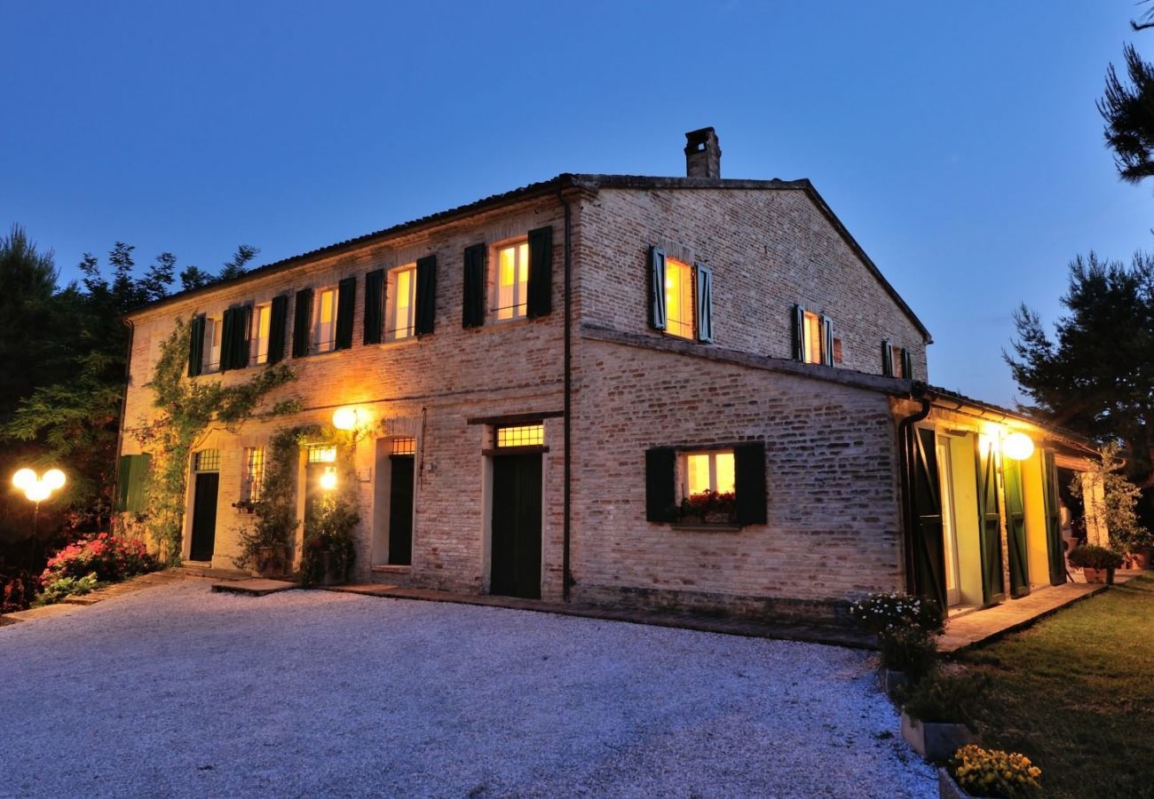 Antico Casolare is an unique villa with private pool and vineyard in Le Marche, Italy. Ideal for large groups!