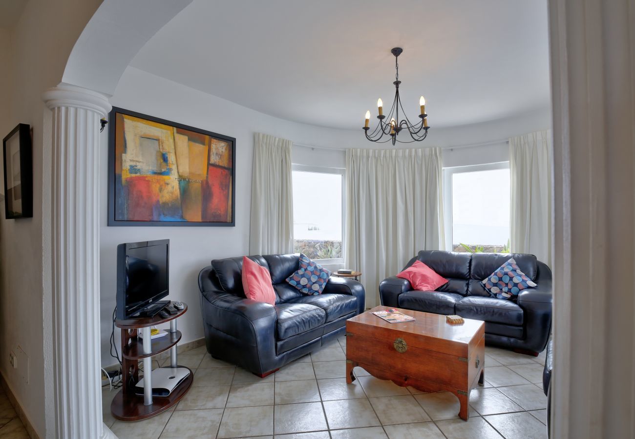 Villa Yana is a one-level villa with private heated pool and sea views. Near beach in Puerto del Carmen, Lanzarote