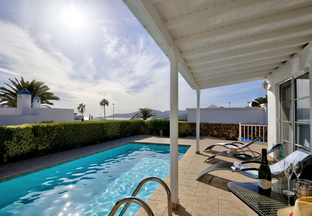 Villa Yana is a one-level villa with private heated pool and sea views. Near beach in Puerto del Carmen, Lanzarote
