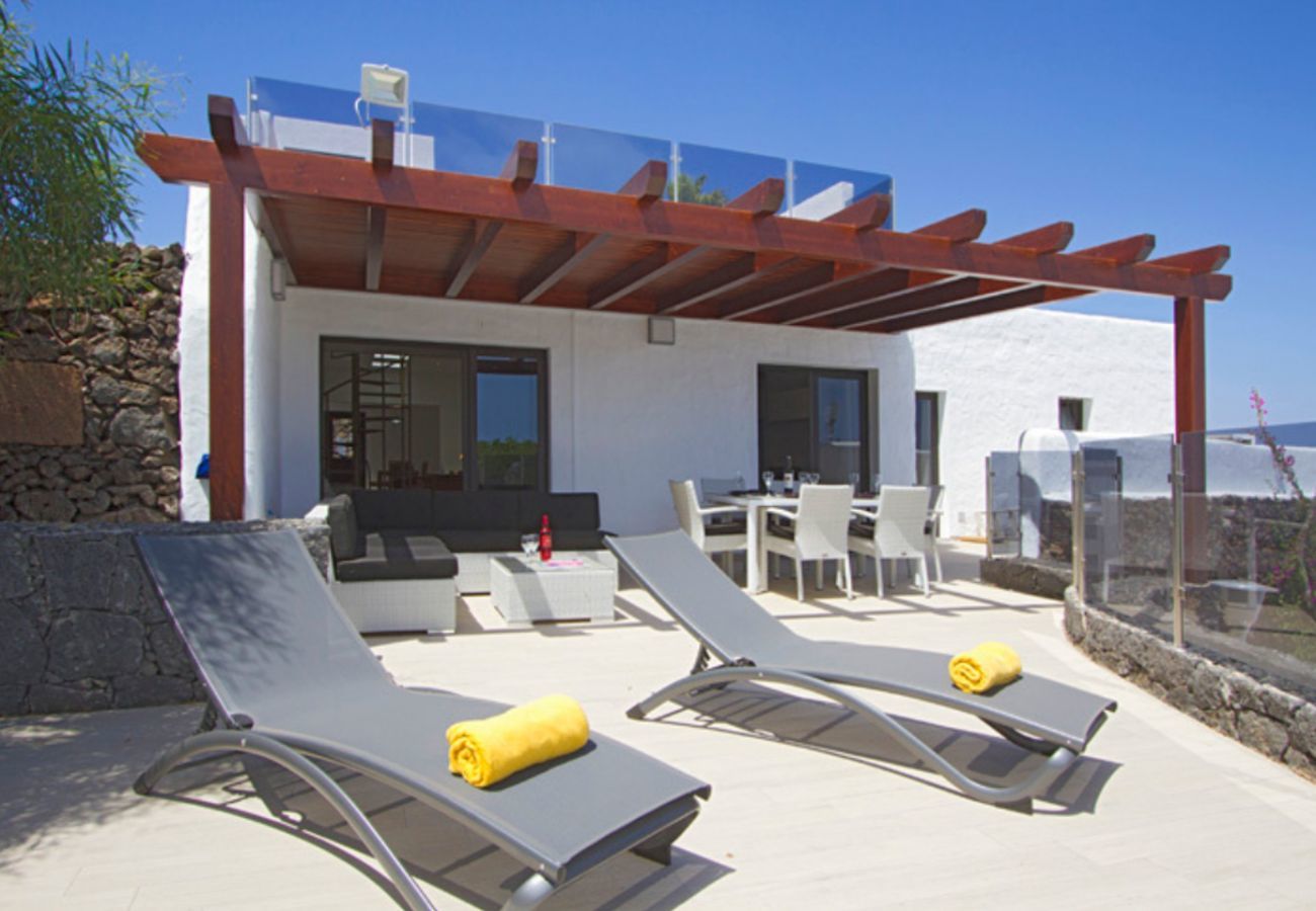 Villa Lexy is a holiday home with heated private pool and seaview in Los Mojones, Puerto del Carmen, Lanzarote
