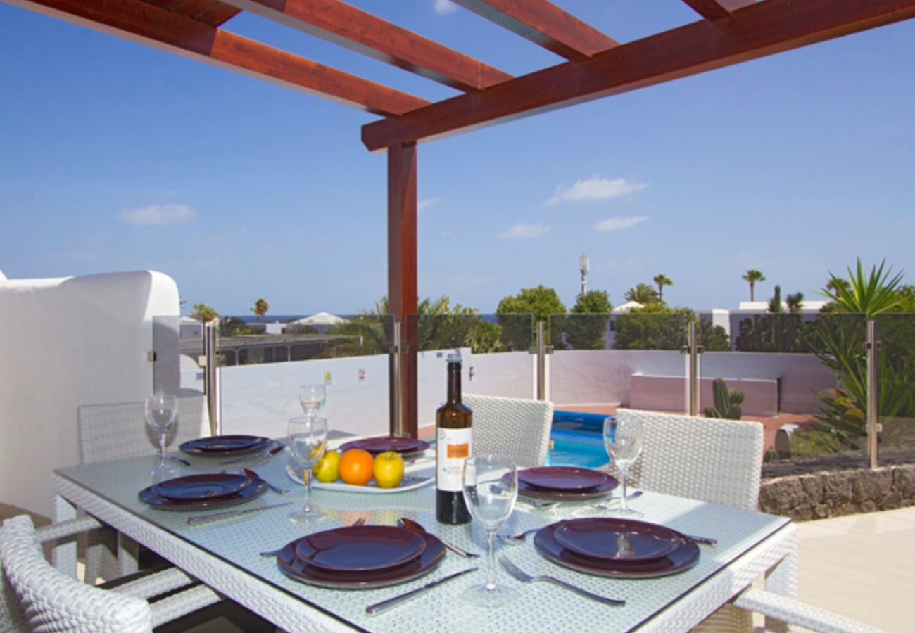 Villa Lexy is a holiday home with heated private pool and seaview in Los Mojones, Puerto del Carmen, Lanzarote