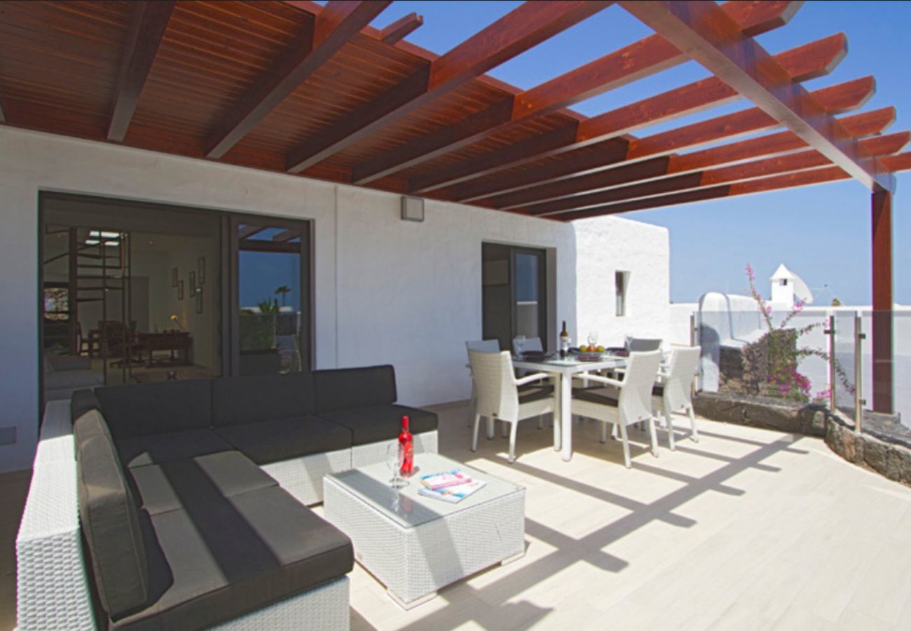 Villa Lexy is a holiday home with heated private pool and seaview in Los Mojones, Puerto del Carmen, Lanzarote