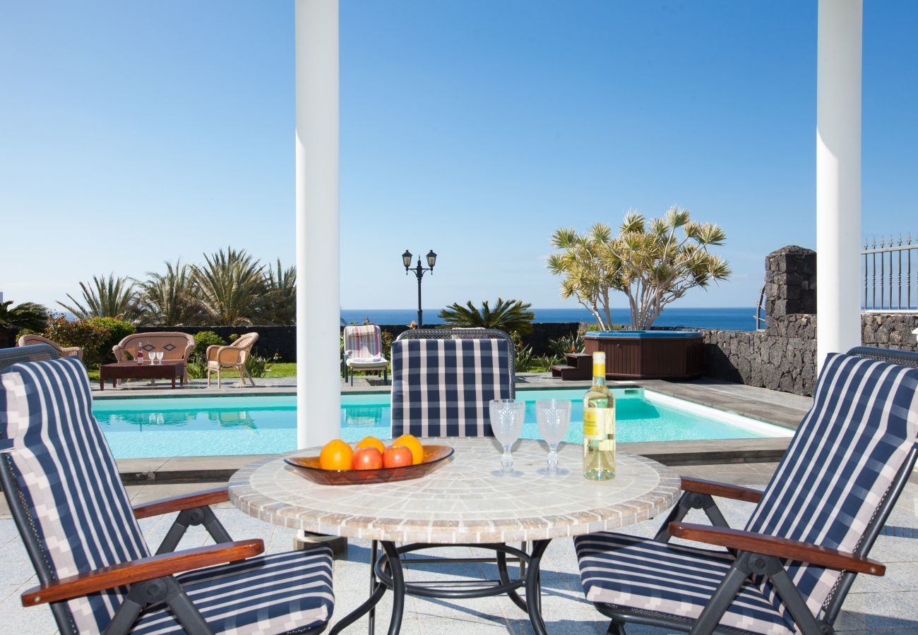 Villa Amy is a luxurious holiday home with heated private pool and sea view. Near centre of Puerto Calero, Lanzarote