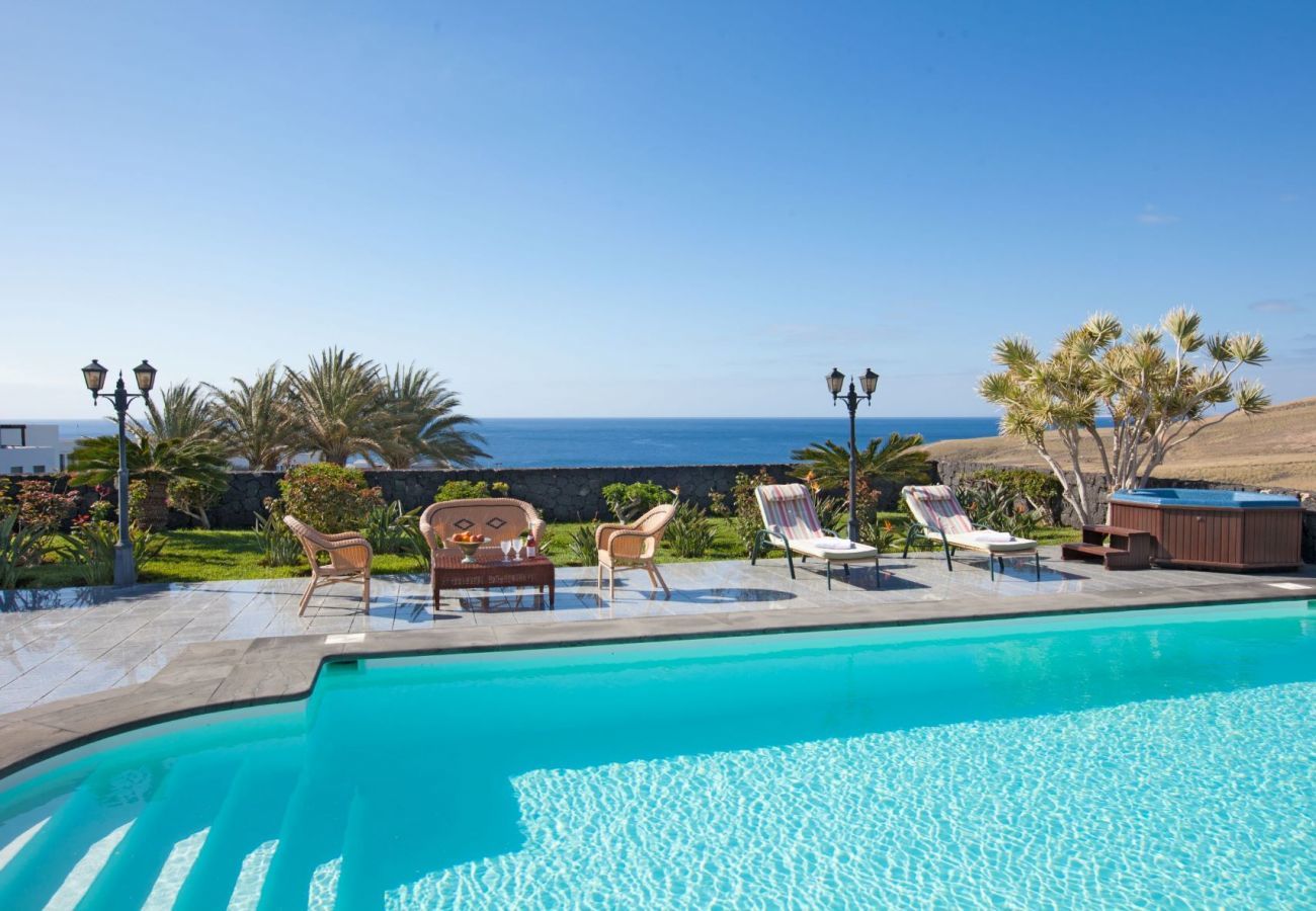 Villa Amy is a luxurious holiday home with heated private pool and sea view. Near centre of Puerto Calero, Lanzarote