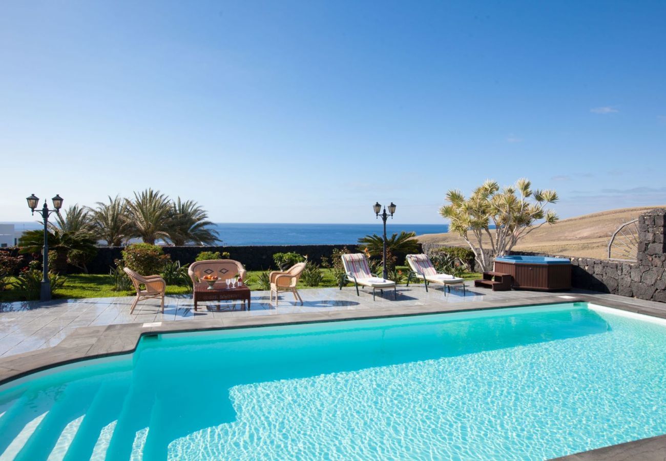 Villa Amy is a luxurious holiday home with heated private pool and sea view. Near centre of Puerto Calero, Lanzarote