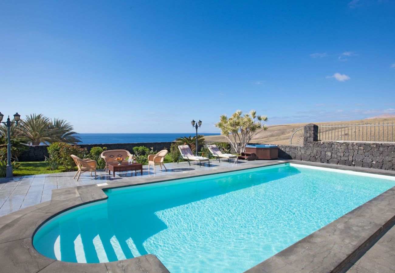 Villa Amy is a luxurious holiday home with heated private pool and sea view. Near centre of Puerto Calero, Lanzarote