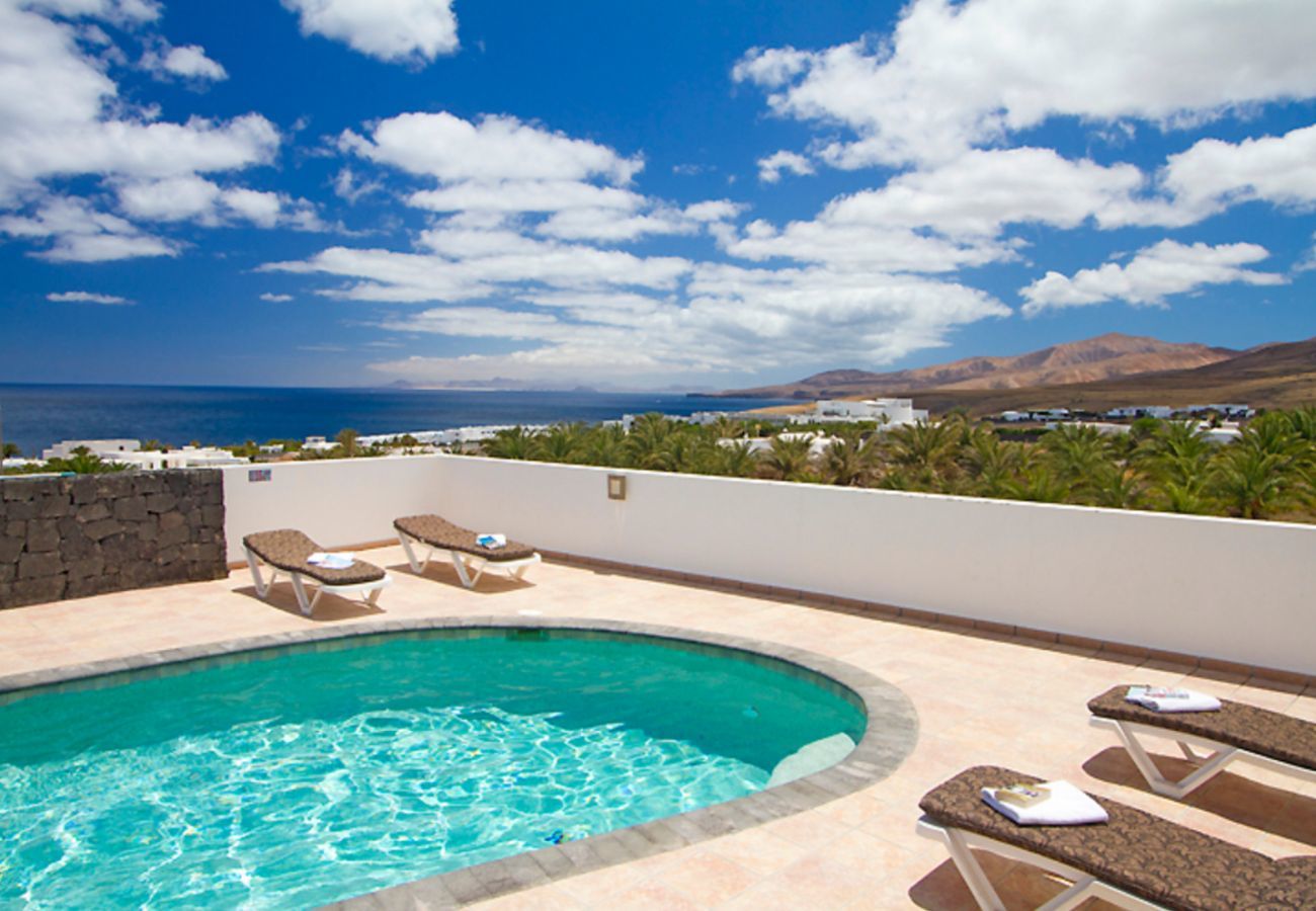 Villa Jane is a luxurious holiday home with heated private pool and panoramic sea view in Puerto Calero, Lanzarote