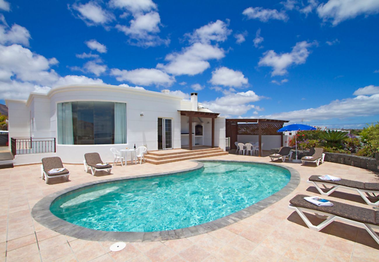 Villa Jane is a luxurious holiday home with heated private pool and panoramic sea view in Puerto Calero, Lanzarote