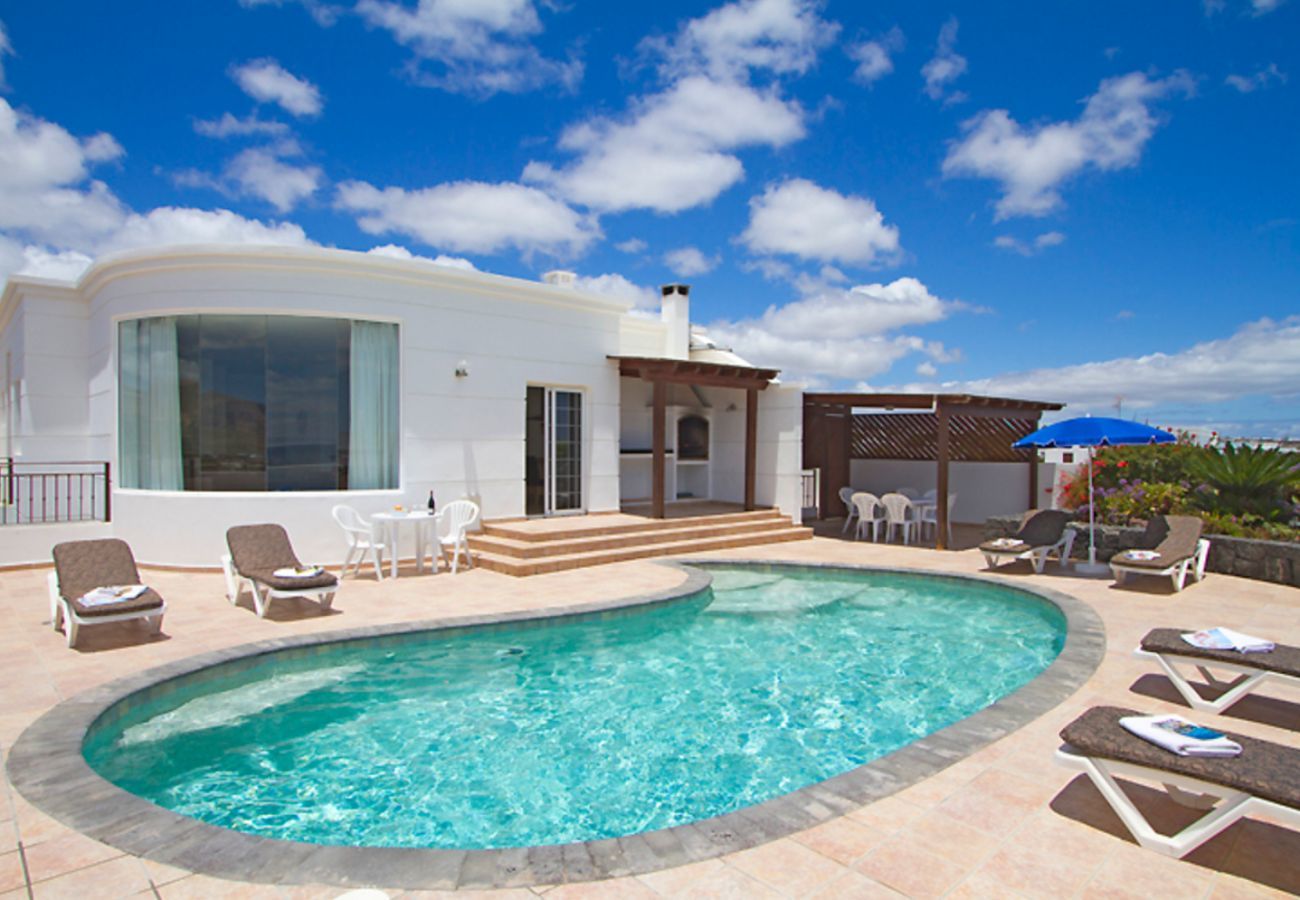 Villa Jane is a luxurious holiday home with heated private pool and panoramic sea view in Puerto Calero, Lanzarote