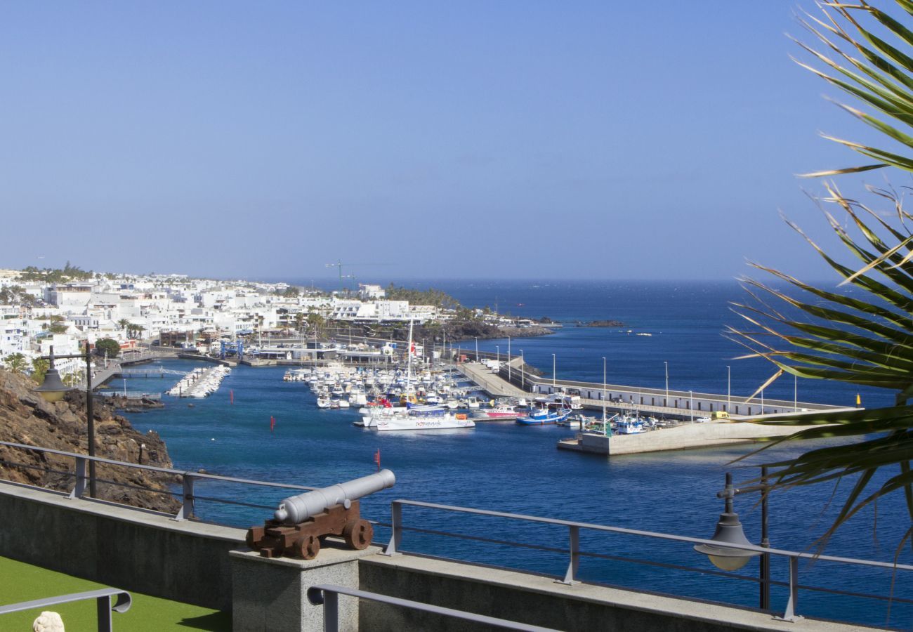 Villa Jill is a modern holiday home with heated private pool and panoramic sea view in Puerto del Carmen, Lanzarote