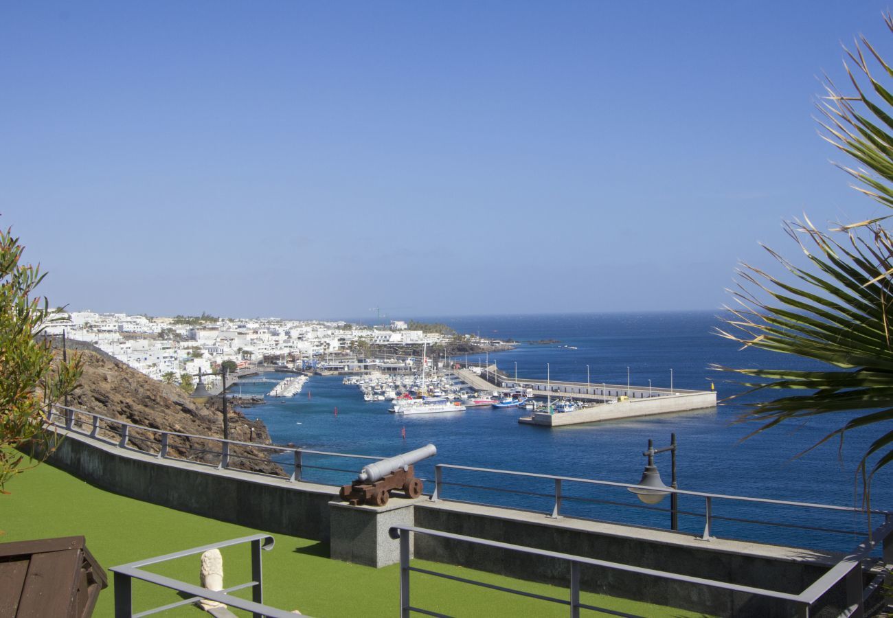 Villa Jill is a modern holiday home with heated private pool and panoramic sea view in Puerto del Carmen, Lanzarote