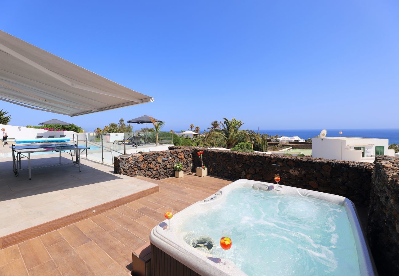 Villa June is luxurious holiday villa with heated private pool and sea view. Great location in Puerto del Carmen, Lanzarote