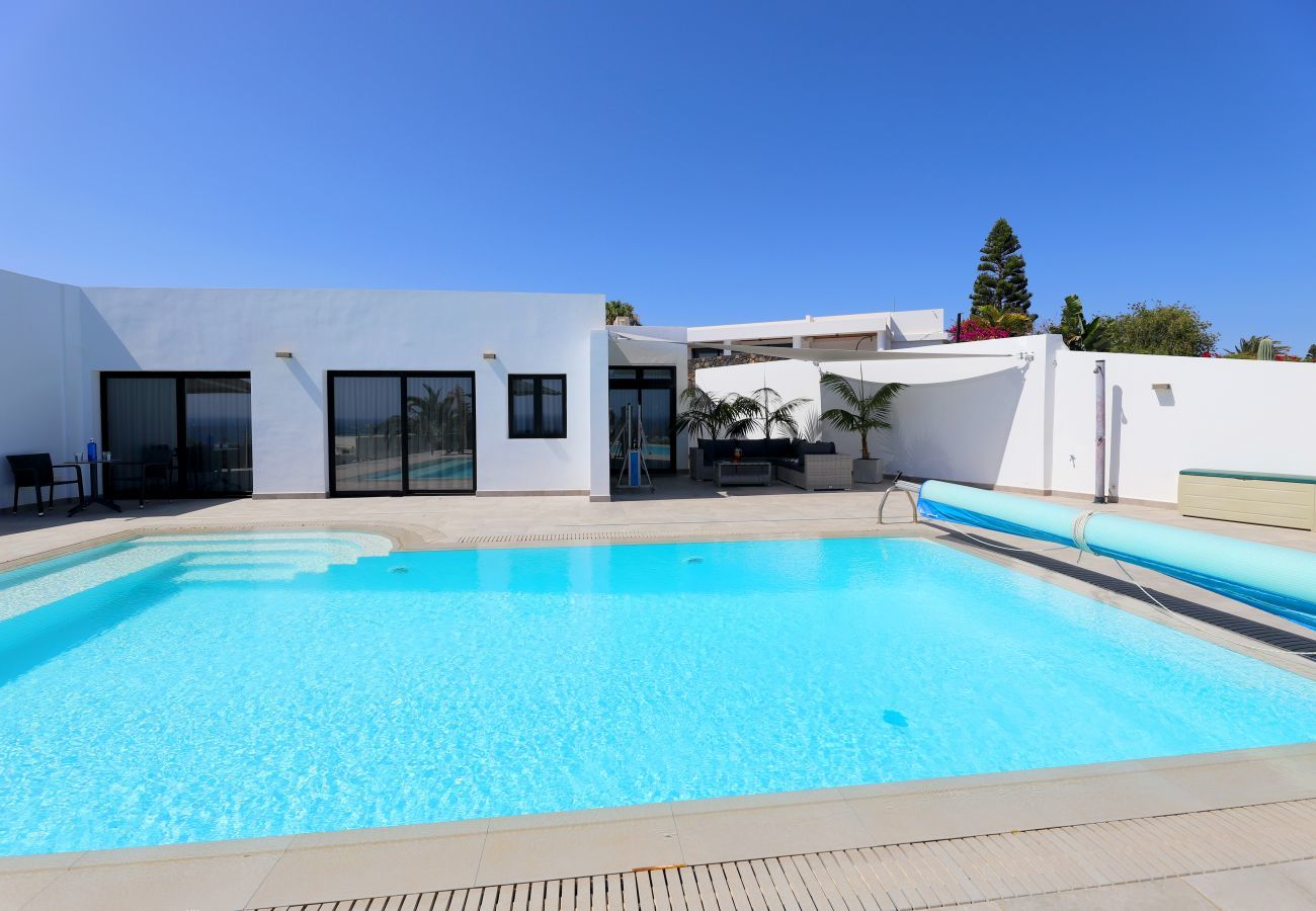 Villa June is luxurious holiday villa with heated private pool and sea view. Great location in Puerto del Carmen, Lanzarote