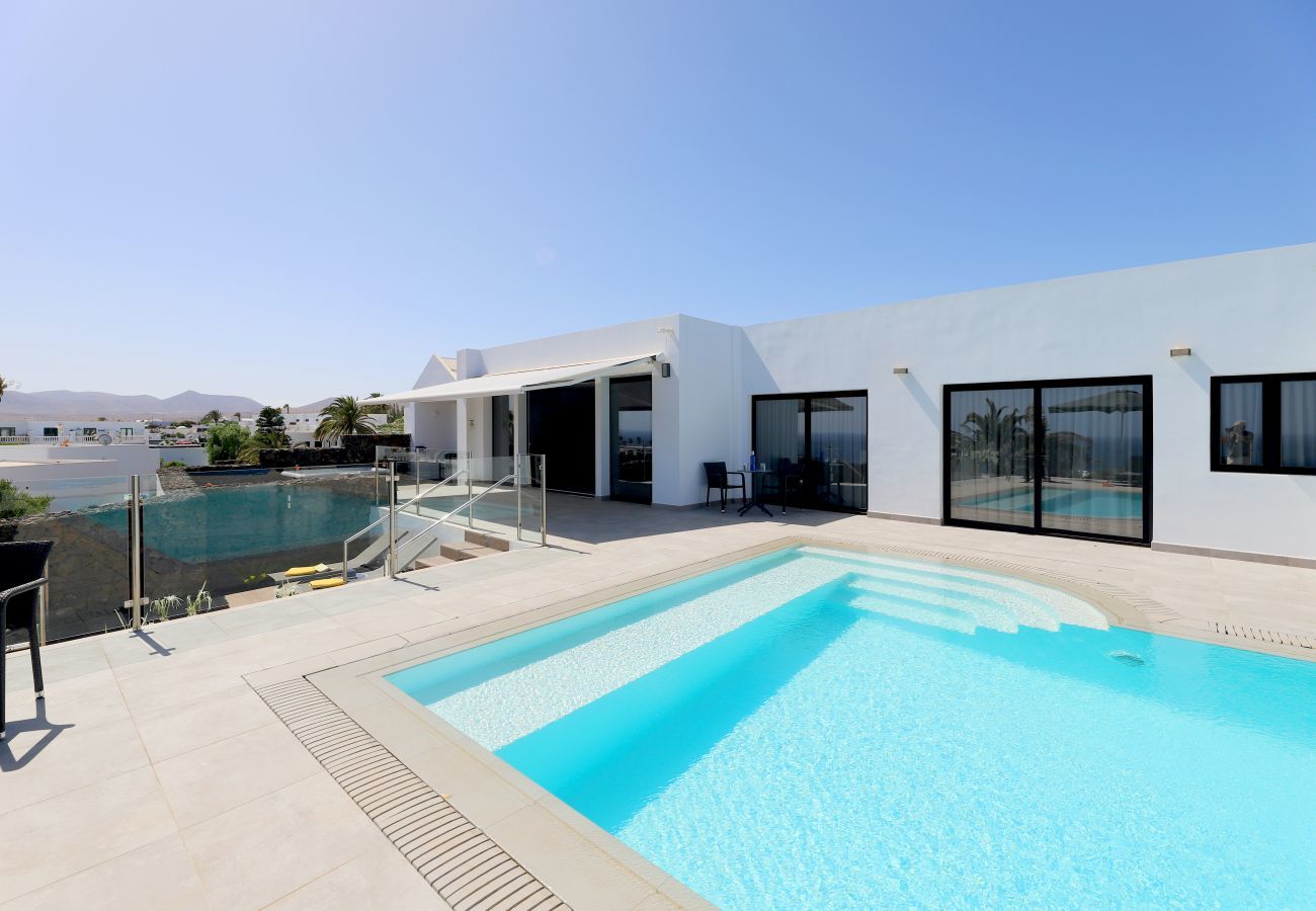 Villa June is luxurious holiday villa with heated private pool and sea view. Great location in Puerto del Carmen, Lanzarote