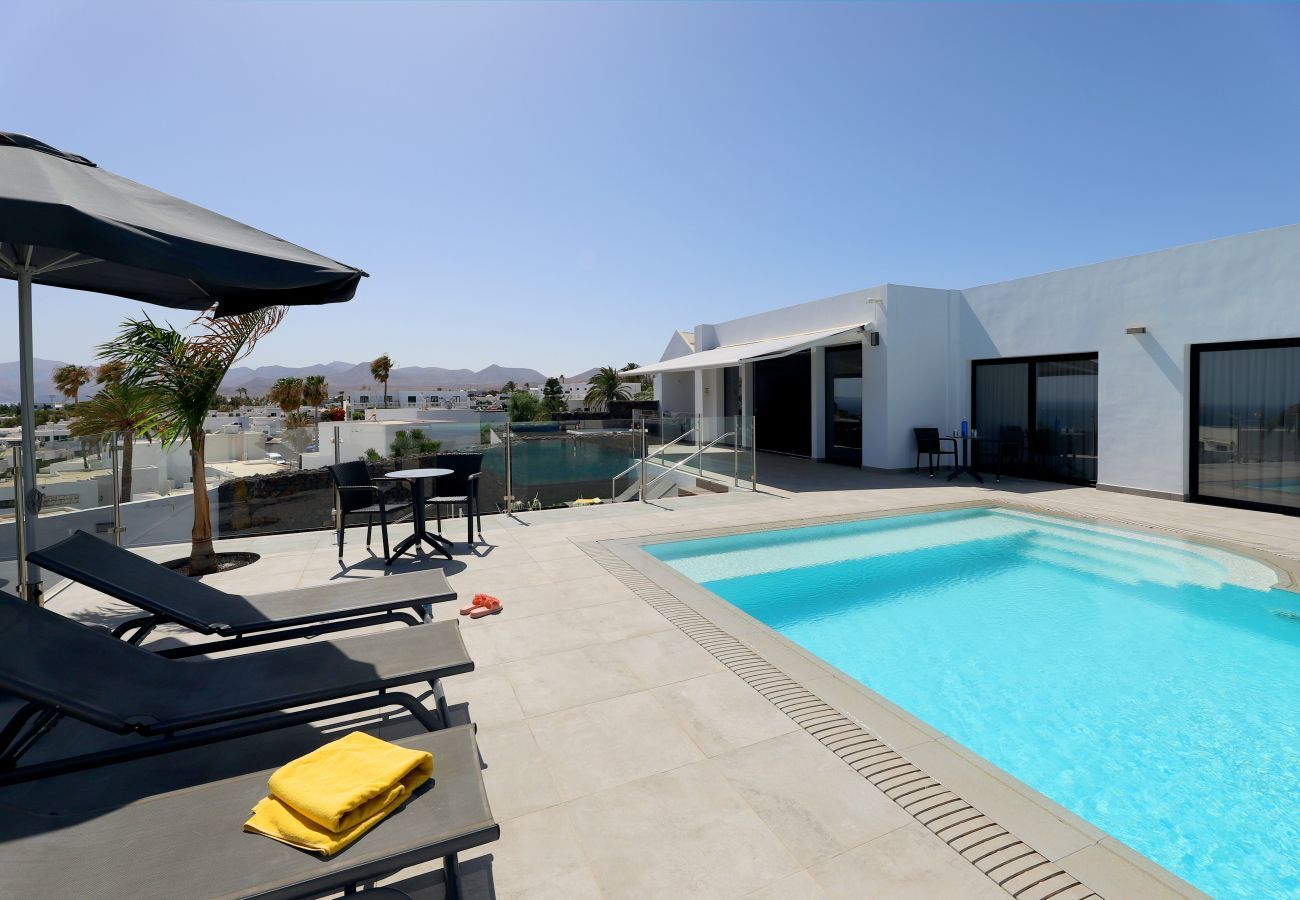 Villa June is luxurious holiday villa with heated private pool and sea view. Great location in Puerto del Carmen, Lanzarote