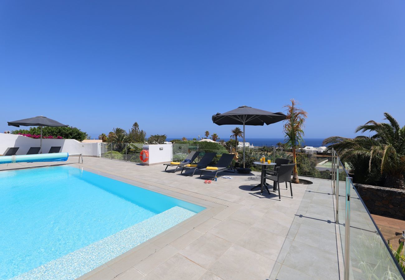 Villa June is luxurious holiday villa with heated private pool and sea view. Great location in Puerto del Carmen, Lanzarote