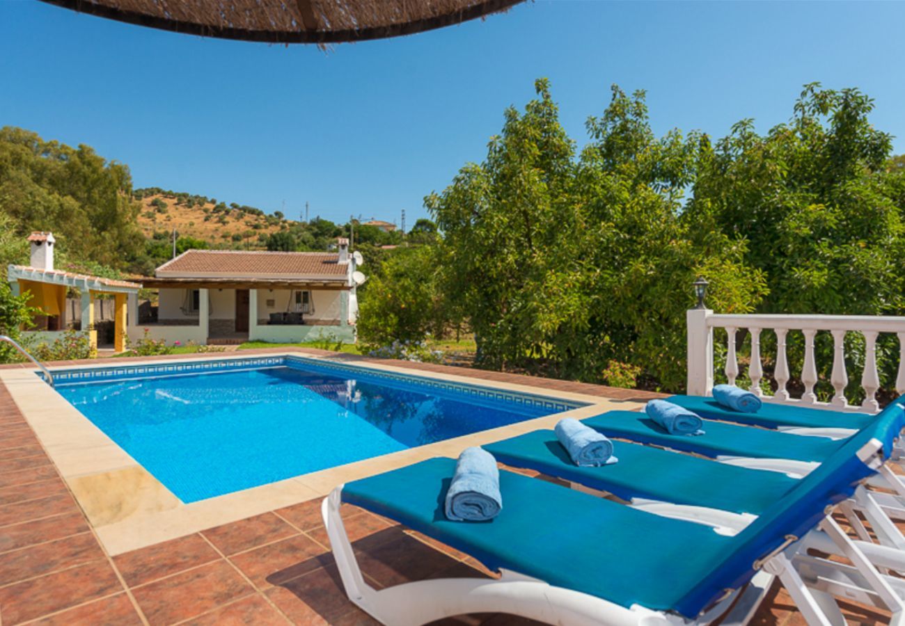 Casita Agua with private pool and fruit trees. On a peaceful location next to the Rio Grande in Alozaina, Andalusië