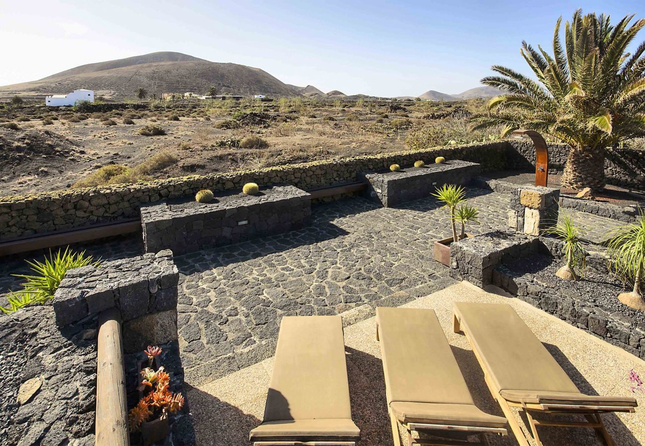 Villa Masdache is a lovely holiday home with large, tropical garden and volcano views in Masdache, Lanzarote