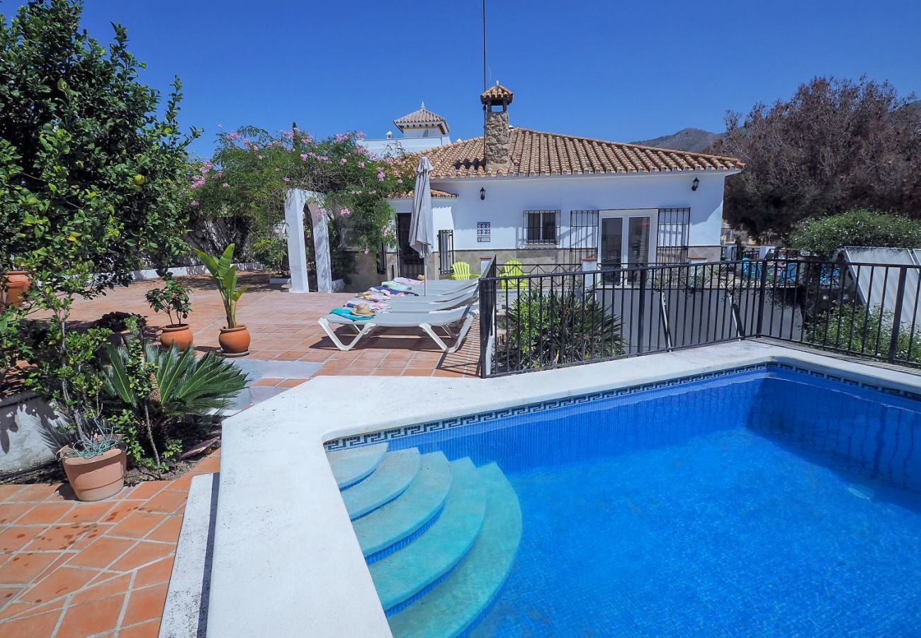 Casa Naranja is a one-level holiday home with garden, private pool and sea view. Near centre and beach in Nerja, Spain