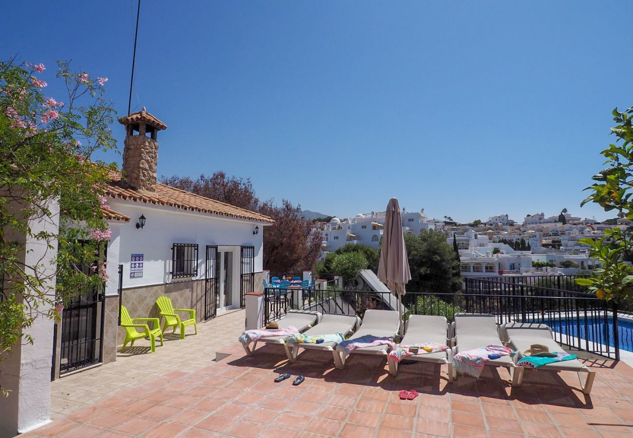 Casa Naranja is a one-level holiday home with garden, private pool and sea view. Near centre and beach in Nerja, Spain