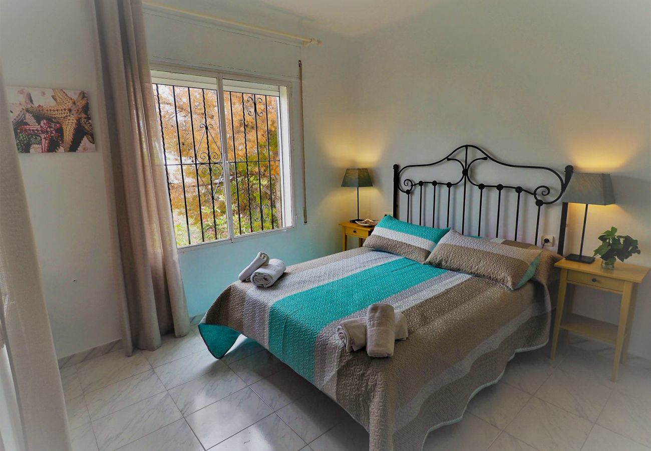 Casa Naranja is a one-level holiday home with garden, private pool and sea view. Near centre and beach in Nerja, Spain