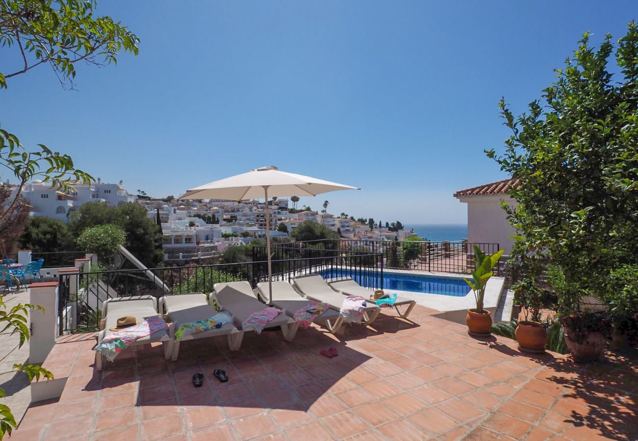 Casa Naranja is a one-level holiday home with garden, private pool and sea view. Near centre and beach in Nerja, Spain