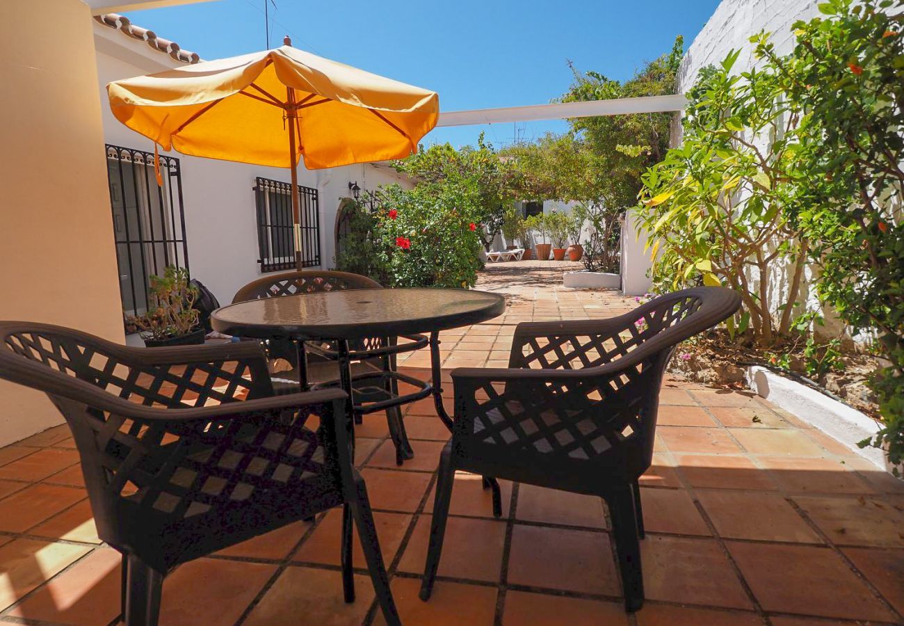 Casa Naranja is a one-level holiday home with garden, private pool and sea view. Near centre and beach in Nerja, Spain