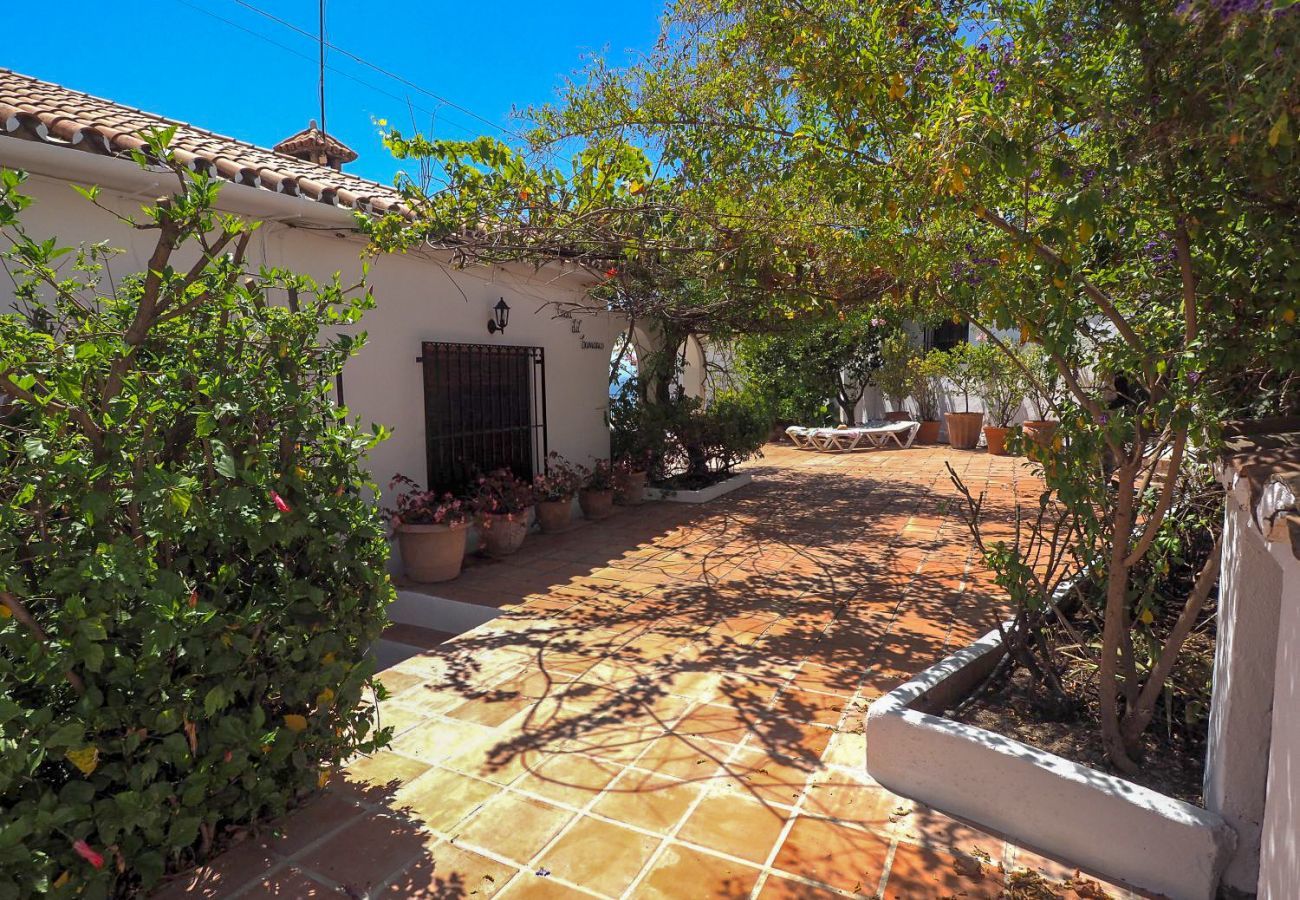 Casa Naranja is a one-level holiday home with garden, private pool and sea view. Near centre and beach in Nerja, Spain