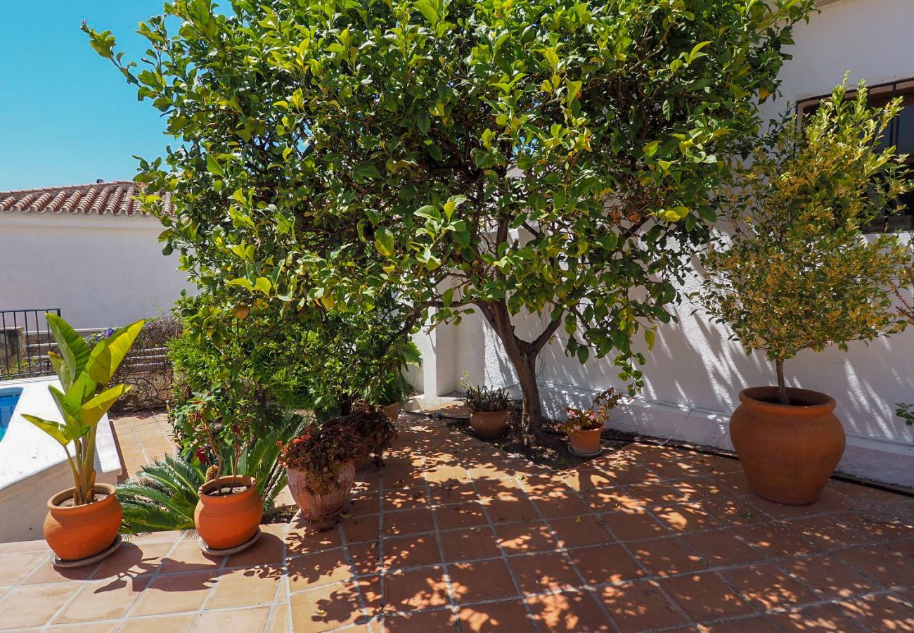 Casa Naranja is a one-level holiday home with garden, private pool and sea view. Near centre and beach in Nerja, Spain