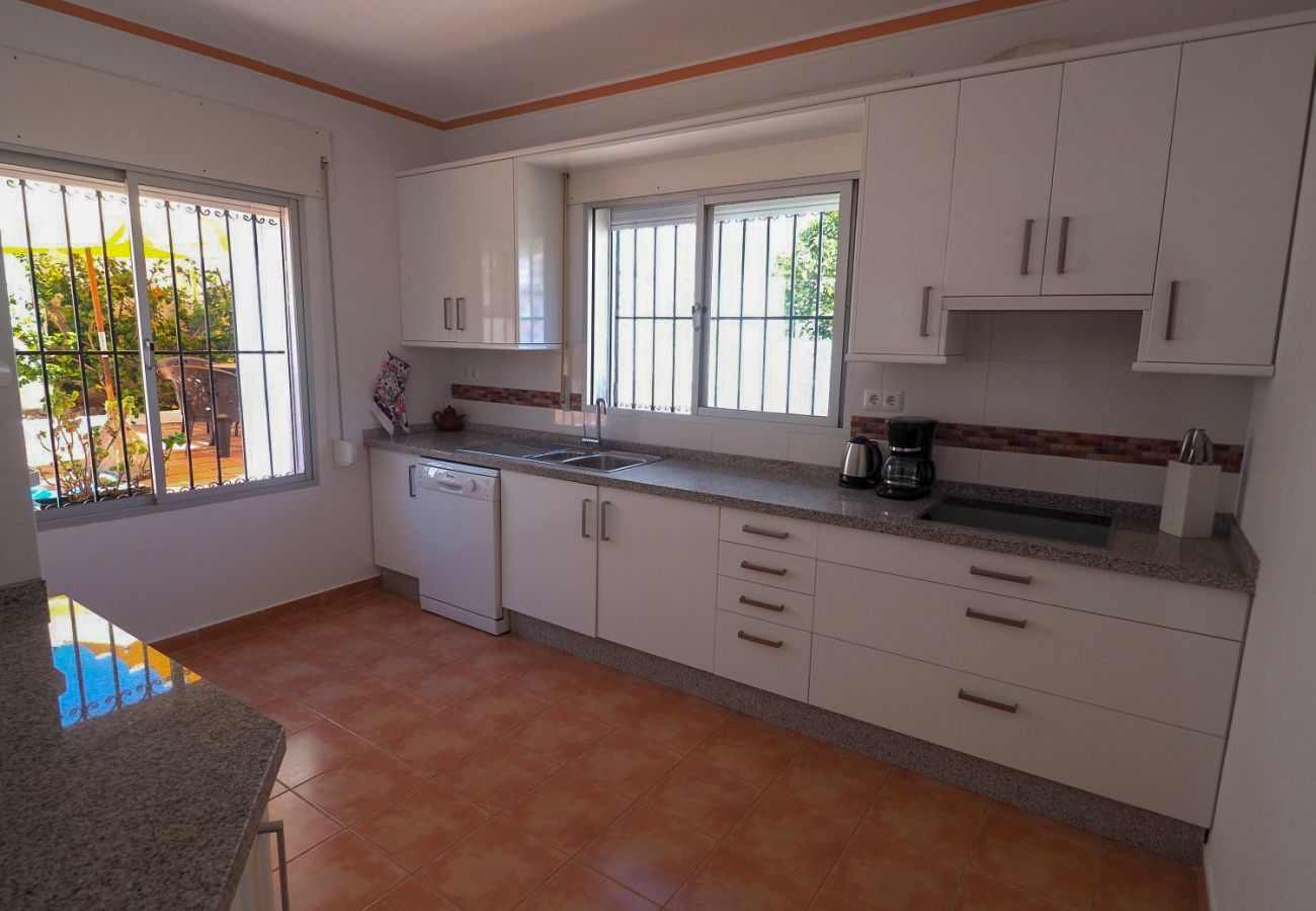 Casa Naranja is a one-level holiday home with garden, private pool and sea view. Near centre and beach in Nerja, Spain