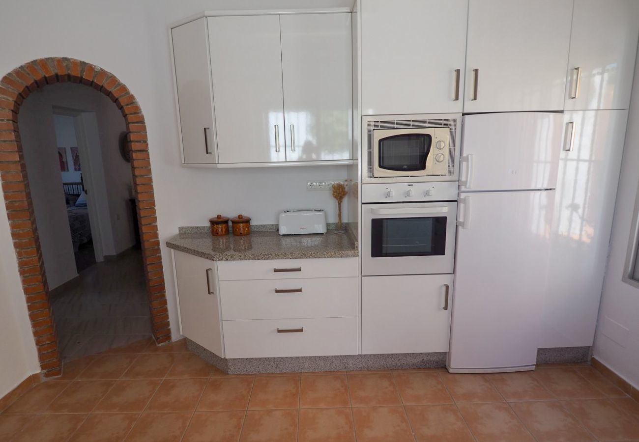 Casa Naranja is a one-level holiday home with garden, private pool and sea view. Near centre and beach in Nerja, Spain